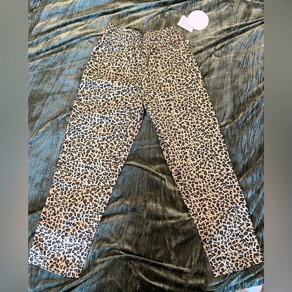 Leopard print chef pants. The small didn’t fit me but I added the size chart. - Picture 3 of 4